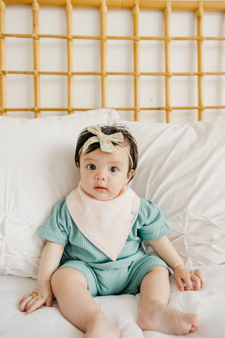 Copper Pearl Lemon Bandana Bib Set featuring soft, stylish bibs with a lemon print for babies, made by Copper Pearl.