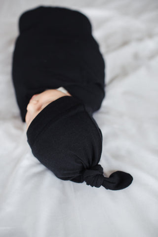 Copper Pearl Midnight Top Knot Hat, soft and cozy baby hat with a stylish knot design in dark gray for infants.