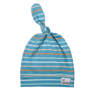 Copper Pearl Milo top knot hat for babies, soft fabric with a stylish knot design, in a copper color.