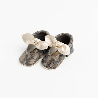 Freshly Picked Platinum Snakeskin Knotted Bow Soft Sole Moccasins, Freshly Picked, Freshly Picked, Freshly Picked Knotted Bow Soft Sole Moccasins, Freshly Picked Moc, Freshly Picked Moccasins