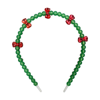 Beaded holiday headband in green with red bows, stylish accessory by Good Grace Design Co featuring festive bead details.