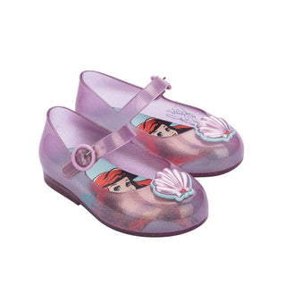 Pink Mini Melissa Mini Sweet Love + Princess BB Ariel shoes with cute bow and character design for young children.