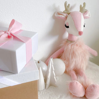 Pink Reindeer stuffed animal named Freija by Mon Ami, soft plush toy with antlers and a cute face, ideal for children.