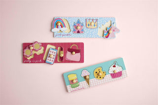 Wooden puzzle toy featuring girly design with colorful pieces, made by Mud Pie, perfect for children's play and learning.
