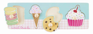 Mud Pie Girly Knob Wooden Puzzle toy featuring colorful dessert-themed pieces for children.