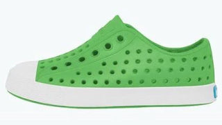 Native Jefferson shoes in grasshopper green and shell white, featuring a casual slip-on design with breathable material.