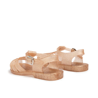 Shooshoos Jelly Sandal Cali in gold glitter with back view, featuring clear straps and a shiny, sparkly design for girls' footwear.