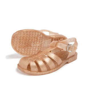 Shooshoos Cali Gold Glitter Jelly Sandal for kids, front view showing shiny gold glitter straps and jelly material.