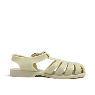 Shooshoos Jelly Sandal Kansas City Shuffle in olive color, showing the playful, transparent jelly material and sandal design.