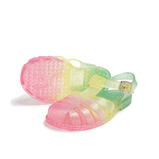 Shooshoos Rainbow Glitter Jelly Sandal for kids, front view showing colorful glitter design and clear jelly strap.