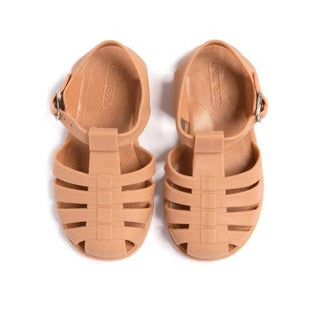 Shooshoos Jelly Sandal Syd in camel color, clear rubber shoes for kids, featuring a simple strap design and glossy finish.