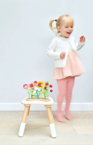Tender Leaf Toys flower bed toy with colorful flowers and green leaves, perfect for imaginative play and gardening fun.
