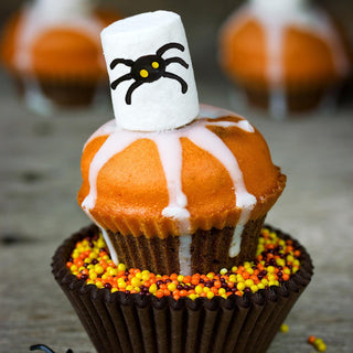 Set of three Tricks & Treats Marshmallow Lollipops from Two's Company, colorful Halloween-themed candy on sticks.