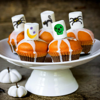 Set of three Tricks & Treats marshmallow lollipops by Two's Company, colorful Halloween-themed candy treats.