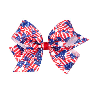 Flag printed grosgrain hair bow on clip from Wee Ones, featuring vibrant flag design and sturdy clip attachment.