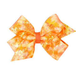 Orange tie dye ombre sequin hair bow on clippie for girls, featuring a vibrant and sparkly accessory from Wee Ones.