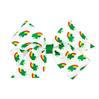 Rainbow shamrock print hair bow on a clippie by Wee Ones, featuring colorful rainbow and shamrock design for kids' hair accessories.