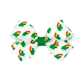 Rainbow Shamrock print hair bow on a clip by Wee Ones, featuring colorful shamrock design for children's hair accessories.